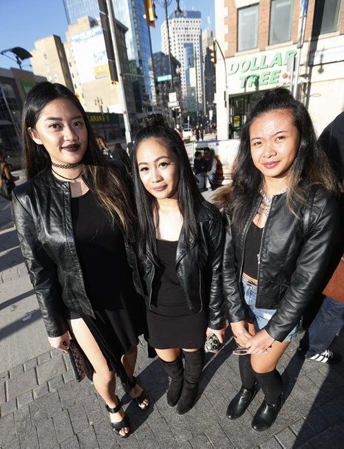 JOHN WOODS / WINNIPEG FREE PRESS Rihanna fans Camille (from left), Camille and AJ pose for a photo before heading into the show  Monday, April 18, 2016.