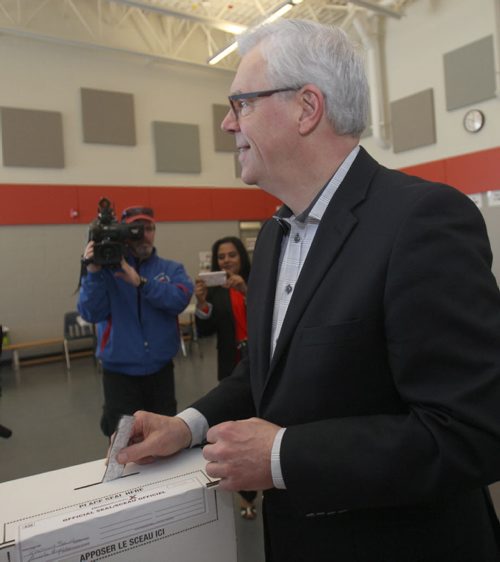 JOE BRYKSA / WINNIPEG FREE PRESS  NDP leader Greg Selinger votes at  Ecole Tache School in St Boniface  Tuesday in  Winnipeg after he voted , Apr 19 , 2016.(Standup Photo)