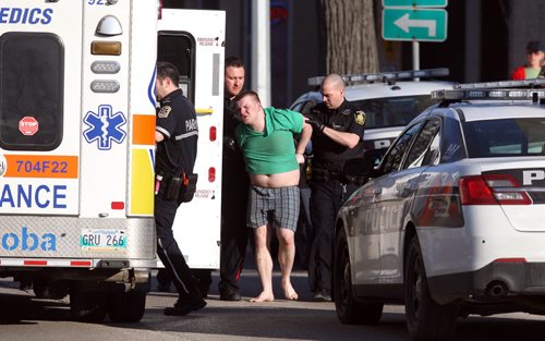 BORIS MINKEVICH / WINNIPEG FREE PRESS A male is arrested outside 411 Cumberland at around 5:30pm. No other info. April 19, 2016