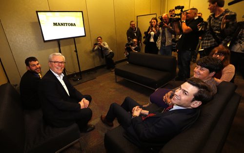 WAYNE GLOWACKI / WINNIPEG FREE PRESS    NDP Leader Greg Selinger with his wife Claudette and sons Eric,at left and Pascal prepare to watch the 2016 election results come in a room next to the NDP 2016 post election gathering Tuesday at the RBC Convention Centre Winnipeg. Kristin Annable  story  April 19  2016