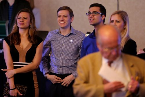 TREVOR HAGAN / WINNIPEG FREE PRESS Supporters watch results come in at the Progressive Conservative party at CanadInns Polo Park, Tuesday, April 19, 2016.
