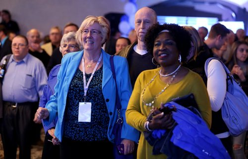 TREVOR HAGAN / WINNIPEG FREE PRESS Supporters watch results come in at the Progressive Conservative party at CanadInns Polo Park, Tuesday, April 19, 2016.