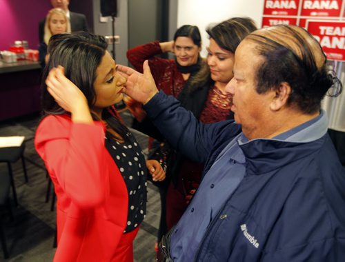 BORIS MINKEVICH / WINNIPEG FREE PRESS Liberal headquarters at the Alt Hotel on Donald. Liberal Leader Rana Bokhari does a quick scrum and then hugs her followers and fellow candidates. In this photo she is congratulated by her dad(right), mother(left, just right of her) and sister (middle).  April 19, 2016