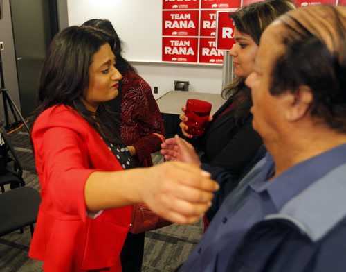 BORIS MINKEVICH / WINNIPEG FREE PRESS Liberal headquarters at the Alt Hotel on Donald. Liberal Leader Rana Bokhari does a quick scrum and then hugs her followers and fellow candidates. In this photo she is congratulated by her dad, mother(left behind Rana) and sister (middle).  April 19, 2016