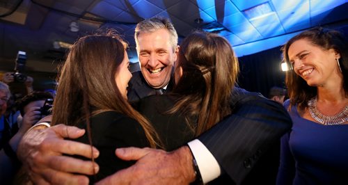 TREVOR HAGAN / WINNIPEG FREE PRESS Progressive Conservative leader, and Premier designate Brian Pallister, his wife Esther and their daughters, Quinn and Shawn arrive to the party at CanadInns Polo Park, Tuesday, April 19, 2016.