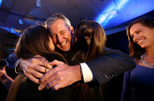 TREVOR HAGAN / WINNIPEG FREE PRESS Progressive Conservative leader, and Premier designate Brian Pallister, his wife Esther and their daughters, Quinn and Shawn arrive to the party at CanadInns Polo Park, Tuesday, April 19, 2016.