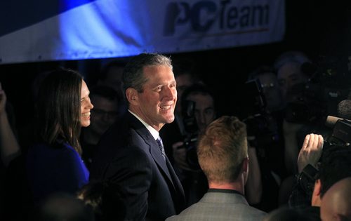 PHIL HOSSACK / WINNIPEG FREE PRESS Brian Pallister and his wife Esther make their way to the stage at PC headquarters Tuesday as the Premier Elect. See story. April 19, 2016