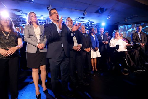 TREVOR HAGAN / WINNIPEG FREE PRESS Progressive Conservative candidates behind Premier designate Brian Pallister, during their victory party at CanadInns Polo Park, Tuesday, April 19, 2016.