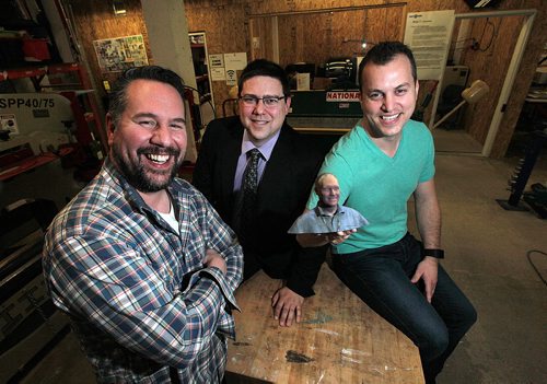 PHIL HOSSACK / WINNIPEG FREE PRESS Left to right - Jeff Ryzner, Michael Legary and Chris Johnson pose in the mock up lab at "AssentWorks" Wednesday afternoon. They're holding a 3-D print of another Assent co-founder Kerry Stevenson. See Martin Cash story re:merger of Eureka Project, the business incubator at the U of M.  April 20, 2016