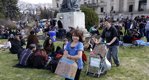 WAYNE GLOWACKI / WINNIPEG FREE PRESS   Know Your Customer.   Julie-Anne,10 and her sister  Kelly,5 (not in photo) with  their mother Amanda LeMay were back this year selling Girl Guide cookies to  participants of the the annual 4/20 marijuana event on the grounds of the Manitoba Legislative building Wednesday. Last year these entrepreneurs sold six cases in a half in hour at  the world-wide celebration of pot and a protest against anti-marijuana laws. April 20  2016