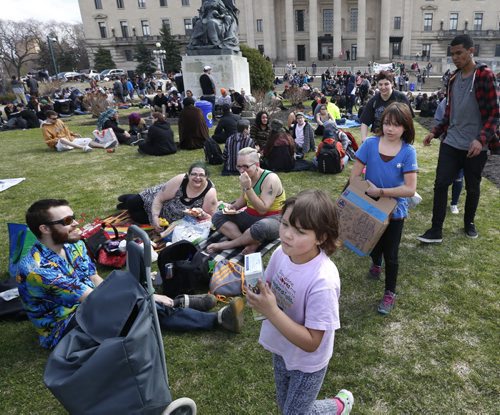 WAYNE GLOWACKI / WINNIPEG FREE PRESS   Know Your Customer.    Kelly,5, her sister Julie-Anne,10 and their mother  Amanda LeMay were back this year selling Girl Guide cookies to  participants of the the annual 4/20 marijuana event on the grounds of the Manitoba Legislative building Wednesday. Last year the entrepreneurs sold six cases in a half in hour at  the world-wide celebration of pot and a protest against anti-marijuana laws. April 20  2016