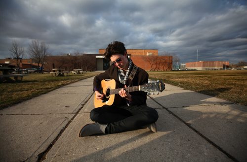 RUTH BONNEVILLE  Volunteers column for the April 25 issue is about Volunteer Manitoba's 33rd annual awards celebration. One of the main sources is Duncan Cox, 19, who volunteers as a speaker and musician with an anti-bullying organization called Hateless.  Portrait of Cox with his guitar outside Miles Mac School.   Aaron Epp story.  April 21, 2016