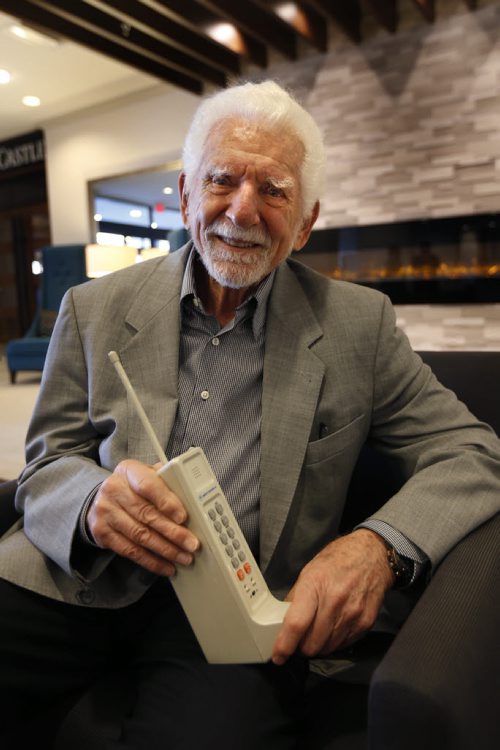 WAYNE GLOWACKI / WINNIPEG FREE PRESS   Martin Cooper, the inventor of the cell phone, he is in Winnipeg to speak to the Information and Communications Technology Association of Manitoba. He is posing with a replica of the first cell phone, the original weighed about a kilogram. Martin Cash story  April 21  2016