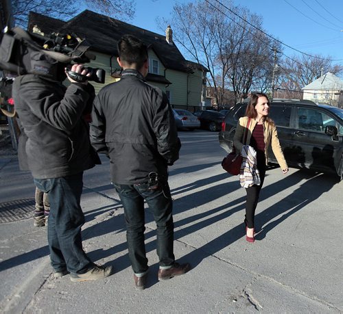 PHIL HOSSACK / WINNIPEG FREE PRESS Newly elected MLA Cindy Lamoureux  makes her way past TV crews into the first post election Liberal board meeting. See Nick Martin story. April 21, 2016