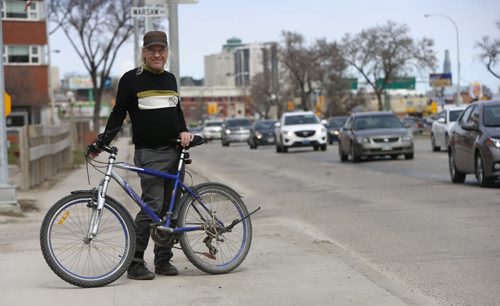 WAYNE GLOWACKI / WINNIPEG FREE PRESS      Mark Cohoe,  Executive Director of Bike Winnipeg with his bike along Pembina Hwy. at  Warsaw Ave.  City hall is preparing for an upgrade to a short stretch of Pembina Highway, from Osborne Street to Grant Boulevard, including separated bike lanes. Its a $11.7 million, two-year project.Aldo Santin story April 22  2016