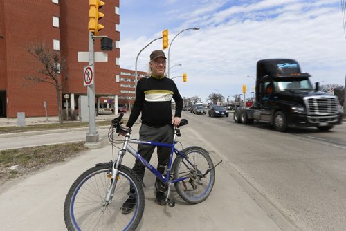 WAYNE GLOWACKI / WINNIPEG FREE PRESS      Mark Cohoe,  Executive Director of Bike Winnipeg with his bike at  Pembina Hwy. and  Warsaw Ave.  City hall is preparing for an upgrade to a short stretch of Pembina Highway, from Osborne Street to Grant Boulevard, including separated bike lanes. Its a $11.7 million, two-year project.Aldo Santin story April 22  2016