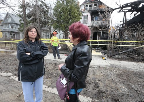 JASON HALSTEAD / WINNIPEG FREE PRESS  Neda Procner (left) and Linda Walker look at Procners house on Maryland Street in Wolseley that was destroyed by fire on April 23, 2016.