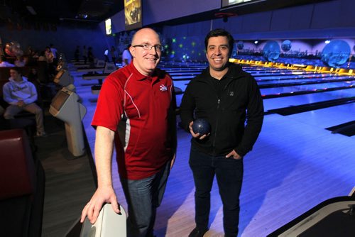 BORIS MINKEVICH / WINNIPEG FREE PRESS Sunday This City column on Academy Uptown Lanes. Twenty years ago, bowling was on a downswing - Academy was close to shutting down - when Todd Britton and his dad decided as a last-ditch effort to introduce glow bowling - a gimmick they heard about at a Las Vegas trade show. (left to right) Manager Nathan Hogg and Owner Todd Britton. April 22, 2016