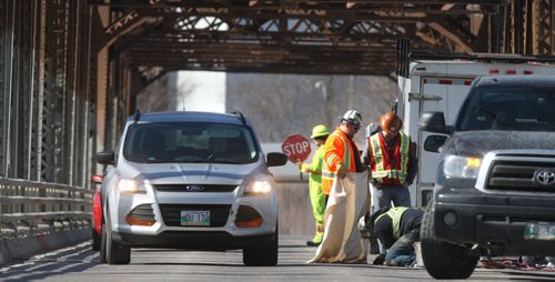 WAYNE GLOWACKI / WINNIPEG FREE PRESS The southbound lane on the Louise Bridge is temporarily closed until  3:30 p.m  Tuesday for repairs to an expansion joint plate.  April 26 2016