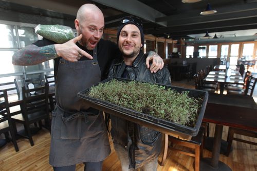 JOE BRYKSA / WINNIPEG FREE PRESS  Constantine Gamvrelis delivers sprouts to head chef Mike Day at the Black Rabbit in the Village  .(See 49.8 story)