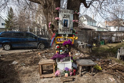 MIKE DEAL / WINNIPEG FREE PRESS A makeshift memorial for Simone Sanderson during a news conference in the vacant lot at Burrows and Main Street where Simone's body was found. 160427 - Wednesday, April 27, 2016
