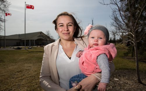 MIKE DEAL / WINNIPEG FREE PRESS Bailey Wall, 24, with her daughter Jordan, 6m, at the Glen Eden Memorial Gardens where a MADD memorial wall is going to be built for the victims of impaired driving. Bailey is the sister to Amy Gilbert who was killed by a drunk driver two years ago. 160427 - Wednesday, April 27, 2016