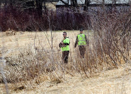 JOE BRYKSA / WINNIPEG FREE PRESS  Searchers scour the banks of the Sturgeon Creek looking for missing 60 yr old Catherine Curtis- She was last seen Monday morning in the St James area of Winnipeg, Apr 27 , 2016.(Breaking news.