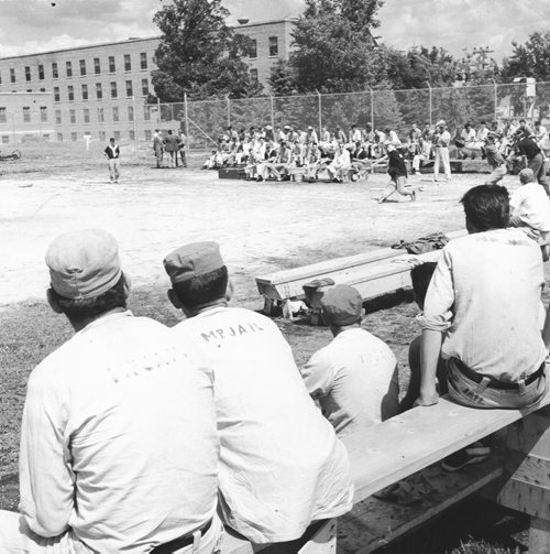 Headingley Jail, July 20, 1956.  Scanned from photograph.  Prisoners watching ball game in the new playing field.