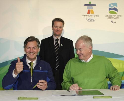 Manitoba Premier, Gary Doer, (L) gestures after signing a contributing province agreement with Vancouver Organizing Committee CEO for the 2010 Winter Olympic and Paralympic Games John Furlong (R) as Colin Hansen, Minister of Economic Development looks on during an anouncement in Vancouver, BC, March 17, 2008. Lyle Stafford/For the Winnipeg Free Press