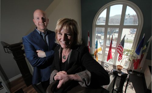 PHIL HOSSACK / WINNIPEG FREE PRESS Derek Earl Vice President,(left) and Mariette Mulaire  President and CEO of World Trade Centre Winnipeg pose in their St Boniface offices Friday morning. See story. April 29, 2016