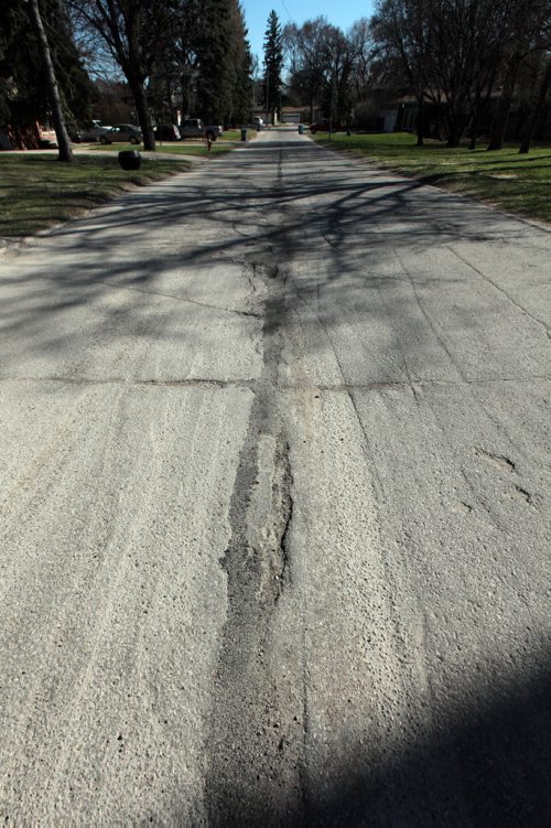 PHIL HOSSACK / WINNIPEG FREE PRESS A one block section of Olive St. will be rebuilt by the city this summer between Portage ave and Assinaboine Ave. See story. April 29, 2016