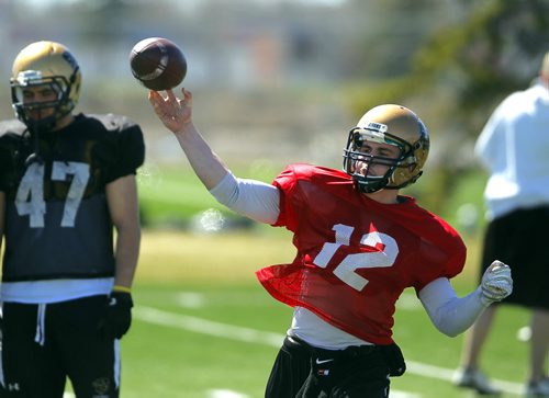 BORIS MINKEVICH / WINNIPEG FREE PRESS Bison football Spring camp at the University of Manitoba turf field. #12 Billy Hart in practice. He is one of the people fighting for backup QB. April 30, 2016