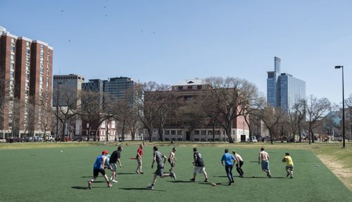DAVID LIPNOWSKI / WINNIPEG FREE PRESS  People play a friendly game of football in Central Park Sunday May 1, 2016.
