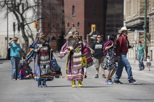 DAVID LIPNOWSKI / WINNIPEG FREE PRESS  Sisters Freda (left) and Ethel Campbell perform during a block party in support of Occupy INAC Winnipeg downtown Sunday May 1, 2016.
