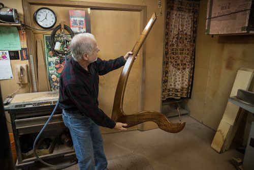 MIKE DEAL / WINNIPEG FREE PRESS Larry Fisher, a Winnipegger who makes what are considered to be the the best Irish harps in the world. Professional players from all over the world order their instruments from Larry, who builds them in his workshop. 160412 - Tuesday, April 12, 2016