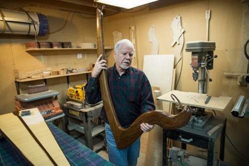 MIKE DEAL / WINNIPEG FREE PRESS Larry Fisher, a Winnipegger who makes what are considered to be the the best Irish harps in the world. Professional players from all over the world order their instruments from Larry, who builds them in his workshop. 160412 - Tuesday, April 12, 2016