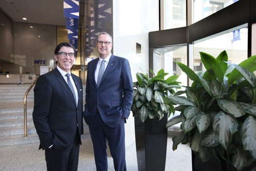 RUTH BONNEVILLE / WINNIPEG FREE PRESS    Biz:MTS CEO Jay Forbes (left)  and  George Cope, the CEO of BCE (Bell Canada Enterprises) have their photo taken together in  the lobby of  MTS Building on Main and Portage after signing  big deal tannouncing Bell ownership of MTS.     May 03, , 2016