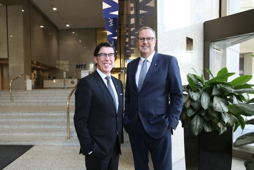 RUTH BONNEVILLE / WINNIPEG FREE PRESS    Biz:MTS CEO Jay Forbes (left)  and  George Cope, the CEO of BCE (Bell Canada Enterprises) have their photo taken together in  the lobby of  MTS Building on Main and Portage after signing  big deal announcing Bell ownership of MTS.     May 03, , 2016