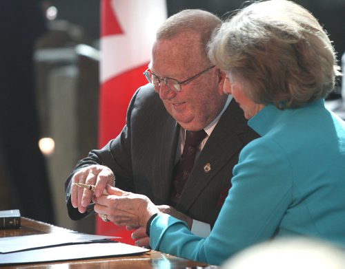 WAYNE GLOWACKI / WINNIPEG FREE PRESS  Ralph Eichler (MLA for Lakeside)  Minister of Agriculture  with Lt. Gov. Janice Filmon at his swearing-in ceremony held in the Garden of Contemplation in the Canadian Museum for Human Rights on Tuesday. In back is Premier Brian Pallister. Nick Martin, Dan Lett, Larry Kusch stories    May3  2016
