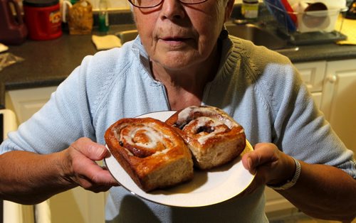 BORIS MINKEVICH / WINNIPEG FREE PRESS 49.8 - Tim Shantz health column. Tim Shantz is putting together different health scenarios for a series of columns. We need a photo of an older woman serving cinnamon buns for this weeks column. May 3, 2016