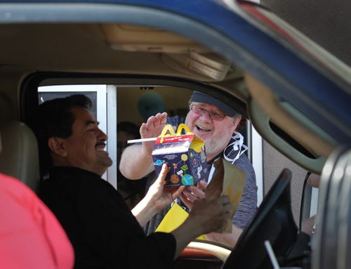 RUTH BONNEVILLE / WINNIPEG FREE PRESS    Free Press humour columnist Doug Speirs, serves up Happy Meals and Big Mac's to customers through the Drive-thru window at  the McDonalds at 1301 McPhillips St. Wednesday over the lunch hour for McHappy Day's, an annual fundraiser that  raises money for Ronald McDonald House.    May 04, , 2016