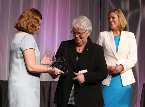JASON HALSTEAD / WINNIPEG FREE PRESS  Marlene Bertrand receives the Eira 'Babs' Friesen Lifetime Achievement Award from YMCA-YWCA board chair Catherine Thiessen (left) and Rochelle Squires (right), Manitoba's Minister of minister of Sport, Culture and Heritage at the the 40th annual YMCA-YWCA Women of Distinction Awards Gala on May 4, 2016 at the RBC Convention Centre Winnipeg. The awards celebrate the talent, achievements, imagination and innovation of Manitoban women. Proceeds from the gala support programs that positively impact the lives of women, youth and children in Winnipeg.