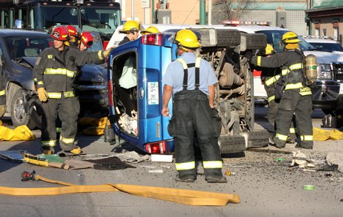 JOE BRYKSA / WINNIPEG FREE PRESS  A single vehicle lost control at Fort and York ave in downtown Winnipeg- Traffic is snarled as the intersection is closed- Fire Dept had to extricate the driver who was trapped in the suv-  May 05 , 2016.(Breaking News)