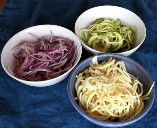 BORIS MINKEVICH / WINNIPEG FREE PRESS RECIPE SWAP - Spiralized vegetables - red onions (purple), sweet potatoes (off white), and dukes (green). May 6, 2016