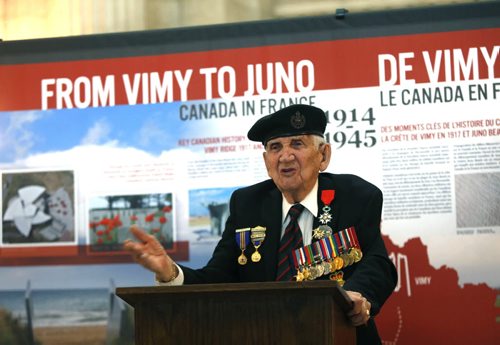 WAYNE GLOWACKI / WINNIPEG FREE PRESS    WW ll Veteran, Paul Martin was with the Royal Winnipeg  Rifles on the first wave landing on Juno Beach in 1944.  After speaking at a special reception celebrating the 71st anniversary of Victory in Europe Day  about his fellow soldiers that died that day he  was given a standing ovation by the about 40 guests attending.  The event was held Friday  by the travelling exhibition FROM VIMY TO JUNO on display at the Manitoba Legislative Bld.   see release      May 6  2016