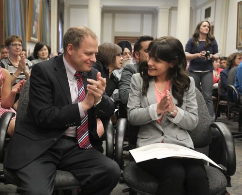 RUTH BONNEVILLE / WINNIPEG FREE PRESS  Proud father Kevin Lamoureux is all smiles as he claps for her daughter Cindy Lamoureux  after she is officially sworn in as one of the three Liberal MLA's Saturday at the Manitoba Legislative Building.   May 07, , 2016