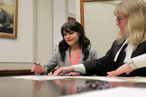 RUTH BONNEVILLE / WINNIPEG FREE PRESS  Cindy Lamoureux signs the official documents at the swearing in as one of the three Liberal MLA's Saturday at the Manitoba Legislative Building.   May 07, , 2016