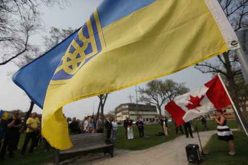 JOHN WOODS / WINNIPEG FREE PRESS Kaitlin Leppki signs Oh Canada as members from the Ukrainian, Jewish, Russian-speaking and Polish communities gather in Vimy Ridge Park for a day of remembrance and reconciliation for those tho died in World War Two, Sunday, May 8, 2016.