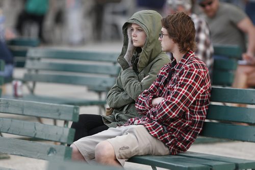 JOHN WOODS / WINNIPEG FREE PRESS Race fans attempt to stay warm on opening day at Assiniboia Downs  Sunday, May 8, 2016.