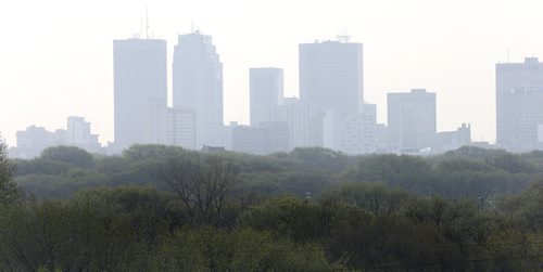 WAYNE GLOWACKI / WINNIPEG FREE PRESS   A smokey haze in Winnipeg Monday morning from the forest fires burning along the Ontario and  Manitoba border. This view is from Westview Park.   May 9  2016